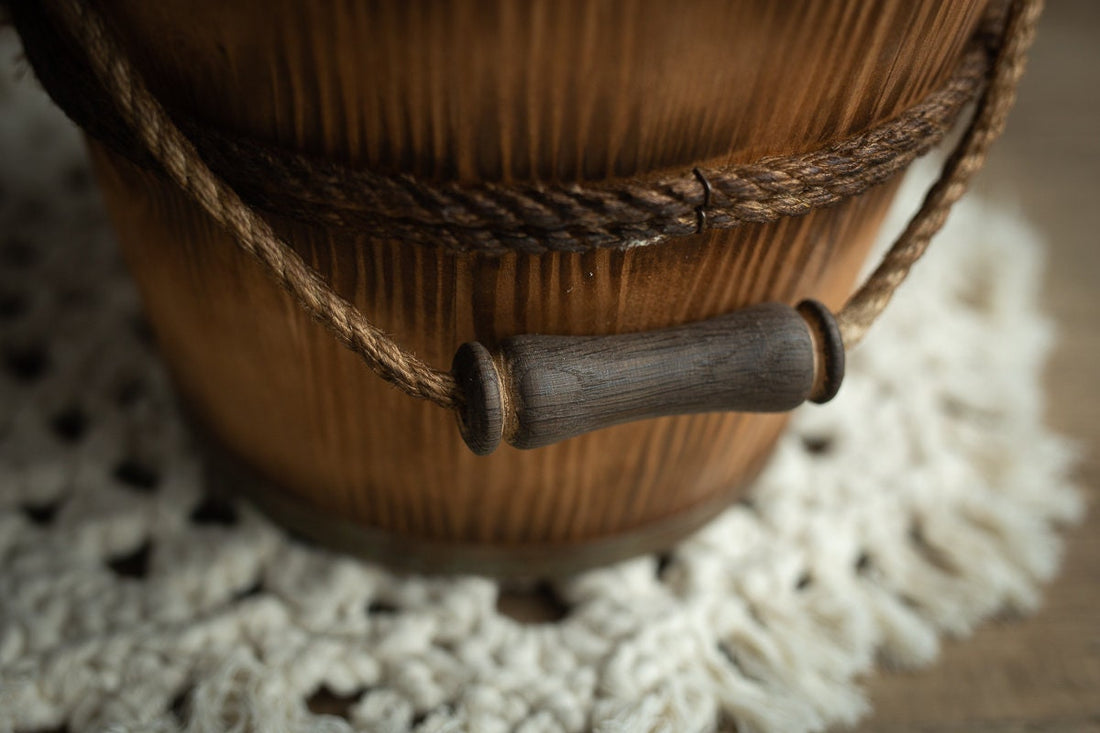 Carved wooden bucket newborn photography prop — natural wood texture