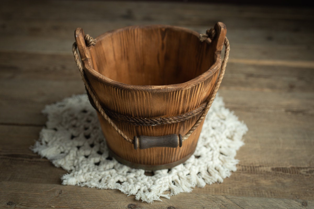 Handcrafted wooden bucket newborn photography prop made from natural pine wood