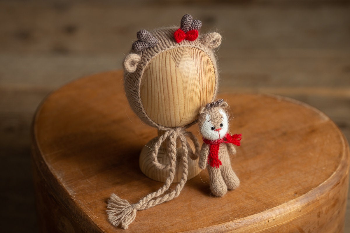 Knitted deer bonnet and toy newborn photography prop set for winter photoshoot