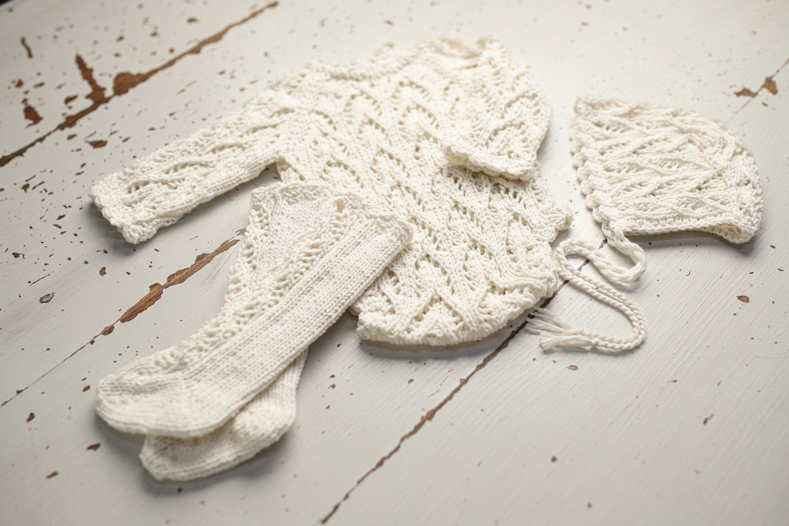 Knitted set for a newborn: jumpsuit, bonnet and socks, clothes for a newborn photo shoot, a gift for a party in honor of the future baby, clothes for discharge from the hospital.