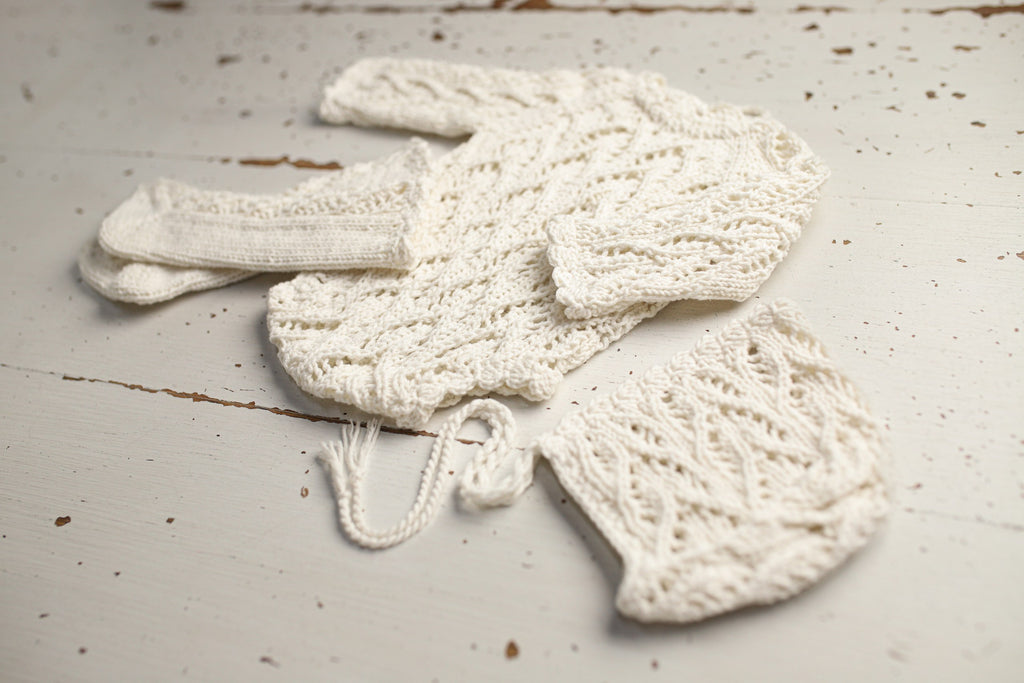 Knitted set for a newborn: jumpsuit, bonnet and socks, clothes for a newborn photo shoot, a gift for a party in honor of the future baby, clothes for discharge from the hospital.