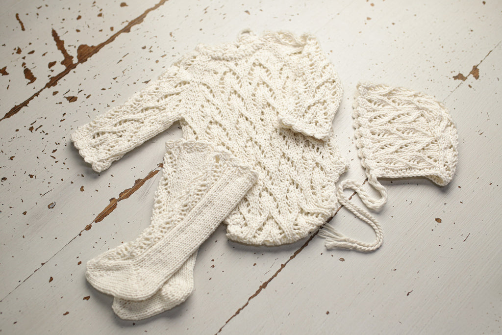 Knitted set for a newborn: jumpsuit, bonnet and socks, clothes for a newborn photo shoot, a gift for a party in honor of the future baby, clothes for discharge from the hospital.