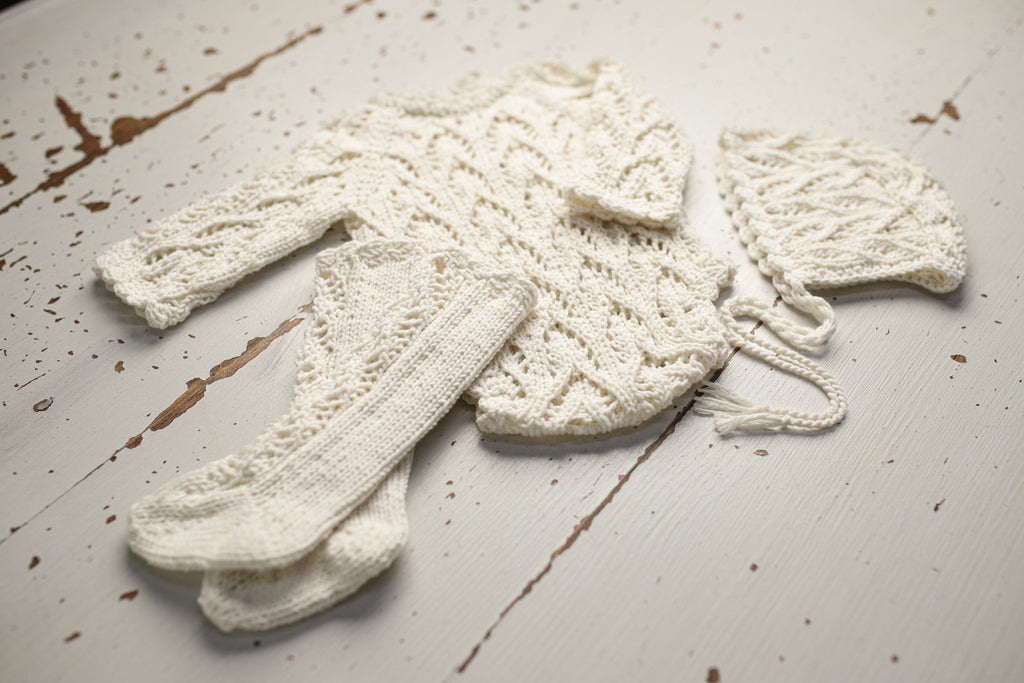 Knitted set for a newborn: jumpsuit, bonnet and socks, clothes for a newborn photo shoot, a gift for a party in honor of the future baby, clothes for discharge from the hospital.