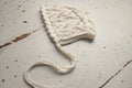 Knitted set for a newborn: jumpsuit, bonnet and socks, clothes for a newborn photo shoot, a gift for a party in honor of the future baby, clothes for discharge from the hospital.